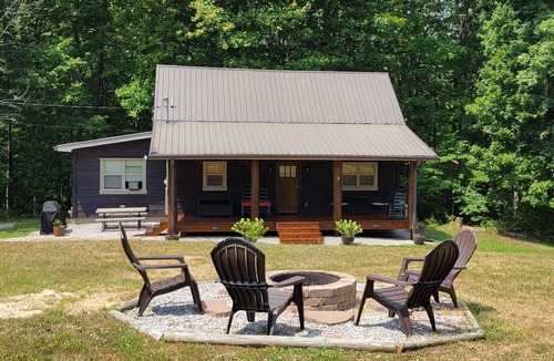 Oneida House | Cozy Forest Cabin on 3 Acres with Hiking, Biking, and Trails.