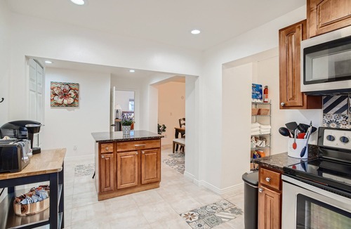 Wheat Ridge House | Cozy homebase in a GREAT LOCATION! Close to Amenities! Awesome deck with games.