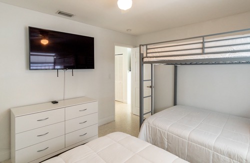 Melaleuca Gardens House | Cozy tropical home! Panoramic view of the canal. Fishing getaway near the ocean!