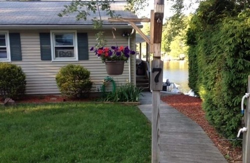 Holland House | Enjoy the Fun of a Lakefront GetAway, While Only Minutes from Local Attractions!