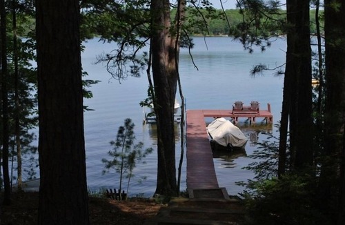 Eagle River House | ExecLogHome~Bass Lk~4BR+Lft/3.5BA~Sauna/Game+TheaterRm/Bar/Row Boat/Pier w/Elec