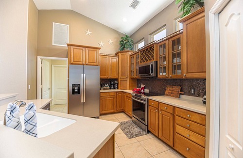 Central Naples House | Exquisite 4 bedroom pool & spa home overlooking a breathtaking lakeview