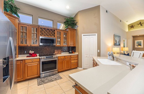 Central Naples House | Exquisite 4 bedroom pool & spa home overlooking a breathtaking lakeview