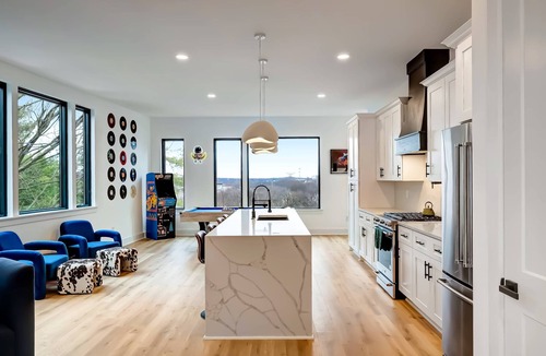 Hurwood Heights House | Fall rooftop hot tub, game room, sauna near Broadway and Geodis Park