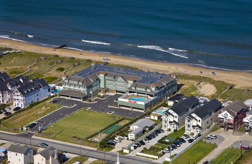 Kill Devil Hills Condo | First Flight Retreat 215: Beachy and Breathable Condo, Oceanfront + Access to Po