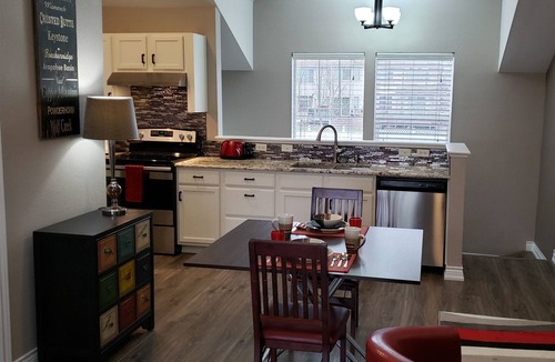 North Central Westminster Apartment | Gorgeous Bradburn Red Carriage House with Huge Deck, Carport and W/D