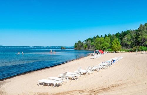 Acme Apartment | Gorgeous Grand Traverse Bay Beach Front Condo