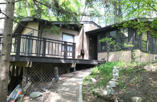 Covert House | Happy Days - located in the desirable rustic gated resort community - Pet Friendly!