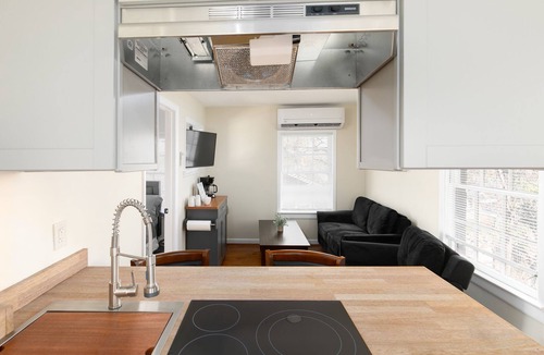 Norwood Condo | Heated Towel Rack Private Parking Workspace