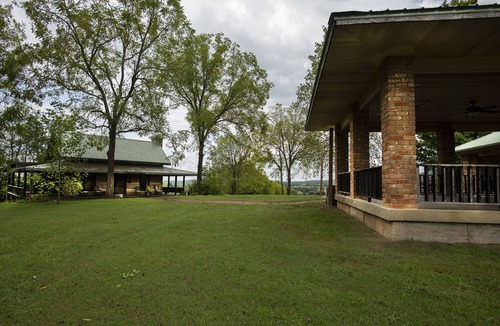 Dixon Springs Cabin | Historic Log Cabin on 200 acre farm, pasture and forest with panoramic views!