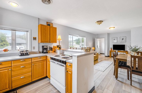 Roads End House | Inviting Haven with Large Yard, WiFi & Partial Ocean View - Steps to Beach