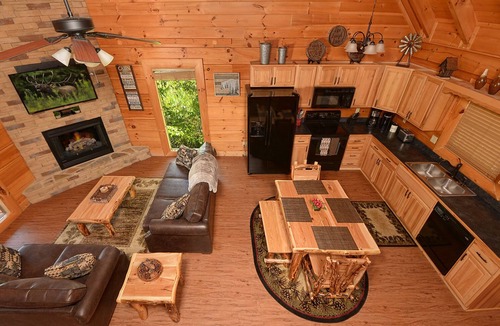 Sevierville Cabin | Just Renovated, Gated Resort, Mini-Golf, WiFi, Pools, Game Loft & What a View!