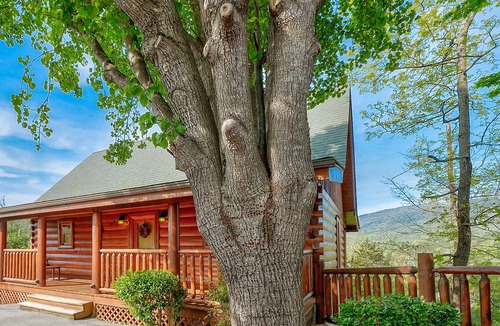 Sevierville Cabin | Just Renovated, Gated Resort, Mini-Golf, WiFi, Pools, Game Loft & What a View!