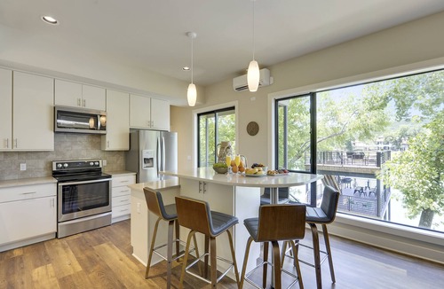 Rio Robles House | Lake Austin Retreat: Chic Lakeside Living w/a 3-Story Dock & Designer Style