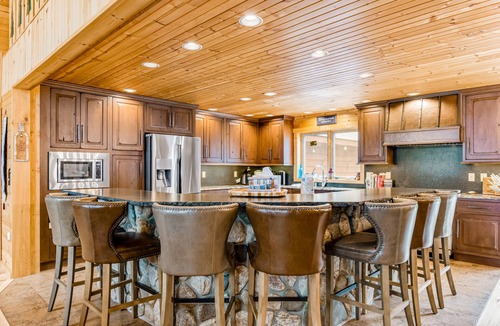 Conover House | Lakefront home with game rooms, dock, kayaks, private beach, fireplace, firepit