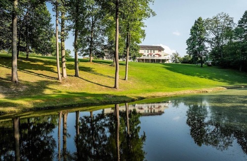 Lansing House | Lansing Orchard · Sleeps 29, 8300 sq ft house, 6 acres, stocked pond