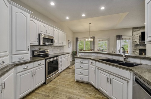 Omaha House | Large Cozy Retreat in West Omaha, Family Friendly with Game Rec Room!