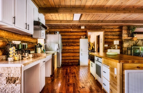 Gatlinburg Cabin | Log Cabin! ADA! Location! Hot Tub! Game Room! Theater! Wood Burning Fireplace!