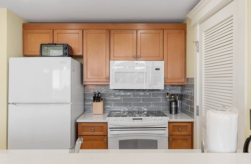 Baytowne Wharf Condo | Lovely Bay Views at Baytowne Wharf! Tropical Pool & Hot Tub, Beach Tram, Gym.