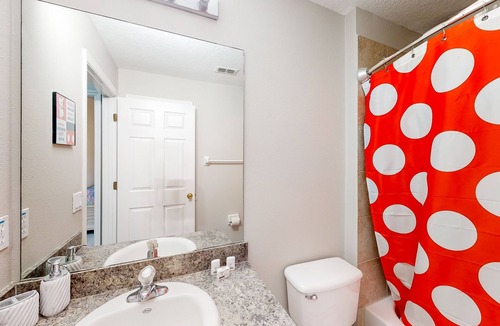 Westbury House | Lovely home with a heated pool, open-concept interior, central AC, and W/D