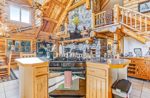 Pagosa Meadows IV Cabin | Luxe lodge w/ amazing mountain view, hot tub, game room & deck - near golf