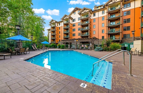 Gatlinburg Condo | Luxury condo steps from downtown with hot tub, pool, & free attraction tickets