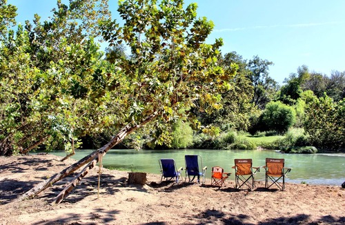 Fentress House | Luxury Glamping on 100+ Acres on the San Marcos River at Wahwahtaysee Resort