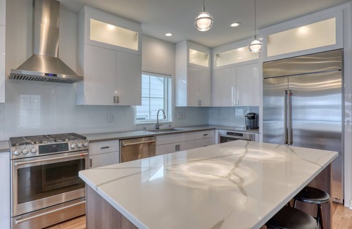 Pewaukee House | Luxury Lakefront Home w Miles of Lake Views, private pier, lake toys & game room