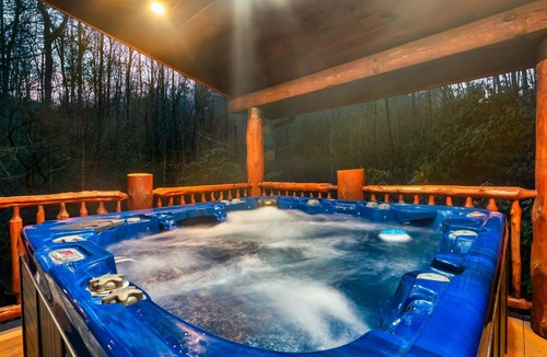 Pittman Center Cabin | Luxury Log Cabin with Hot Tub, Fire Pit, Game Loft in the Smokies