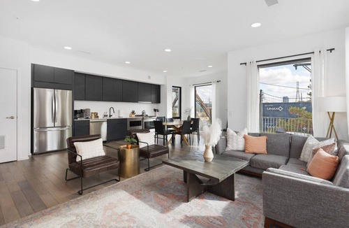 North Capitol Apartment | Luxury on the River - Walk to Downtown, 2 Private Patios & Garage Parking