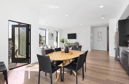 North Capitol Apartment | Luxury on the River - Walk to Downtown, 2 Private Patios & Garage Parking