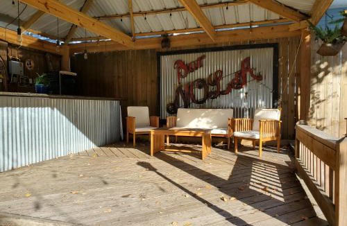 Bywater House | Macarty House, A Bohemian Resort with pool and cabana bar