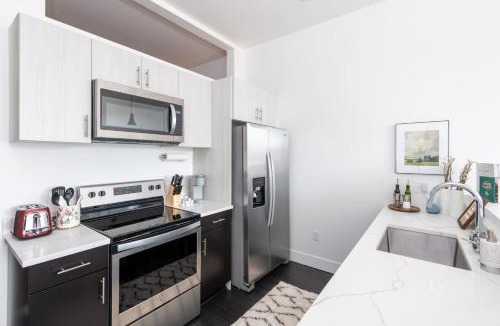 Milwaukee Apartment | Modern 1BR Apt with Skywalk to Fiserv, Rooftop, and Parking
