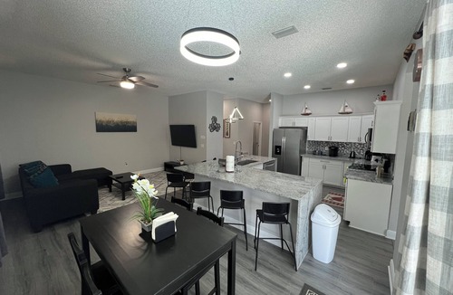 Cocoa House | Modern and spacious getaway with a pool and grill
