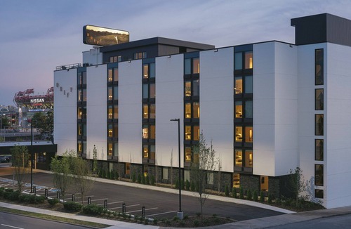 East Bank Hotel | Modern Hideaway with Rooftop Lounge, Pool, Firepits & City Views