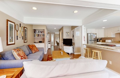Shipyard Plantation Condo | Modern, light-filled villa with 2 living areas, pool, easy beach access, & patio