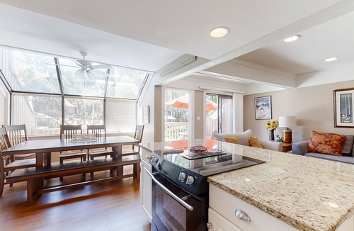 Shipyard Plantation Condo | Modern, light-filled villa with 2 living areas, pool, easy beach access, & patio