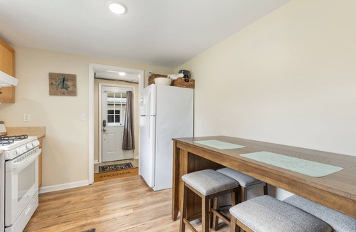 East Lansing House | MSU 2BR Home w/Garage, EV Charger, Patio & Grill – Walk to Campus