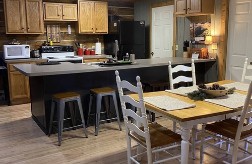 New Rumley Cabin | n Rustic Cabin Retreat on 120 Acres with Private Lake, Wildlife, and Fireplace.