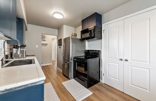 Midvale House | NEW! Charming Mountain View Home w/Huge Fenced Yard, King Beds & TV's, Fireplace