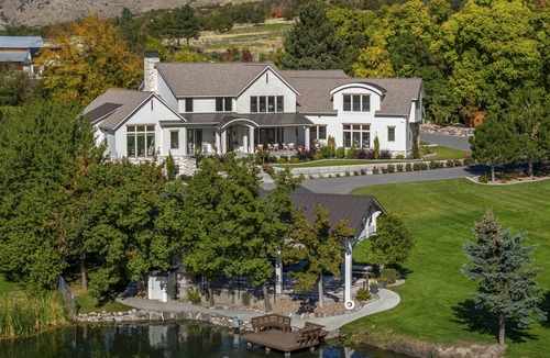 Mapleton House | New resort-style vacation property with ponds, pool, sport court and theater