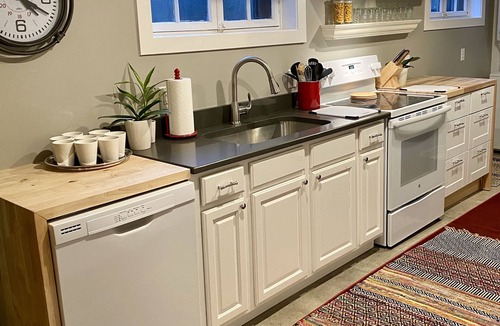 Cherry Creek House | Old World Charm Basement Level Flat in upscale Cherry Creek