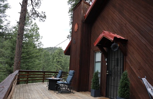 Ruidoso Cabin | Perched in the pines -wrap around porch w/outdoor dining, fire pit, & wildlife