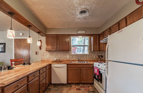 Ruidoso House | 'Permit to relax Granted!' at License to Chill with hot tub and detached Game Room.