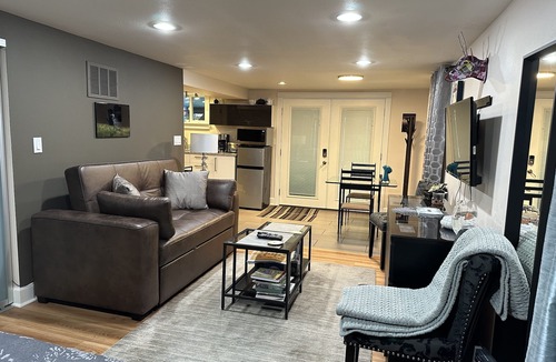 Belmont House | Pet friendly apartment with covered patio and fenced-in yard.