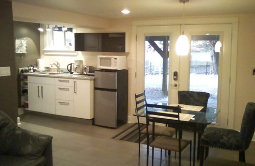 Belmont House | Pet friendly apartment with covered patio and fenced-in yard.