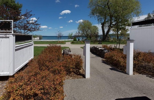 Suttons Bay Cottage | Quiet, Private, Waterfront - Luxury on 125 Ft. of Suttons Bay