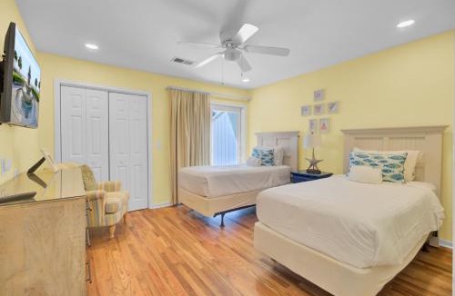 Twin Oaks House | Racquet Club 23 by Wild Dunes, in Resort Core