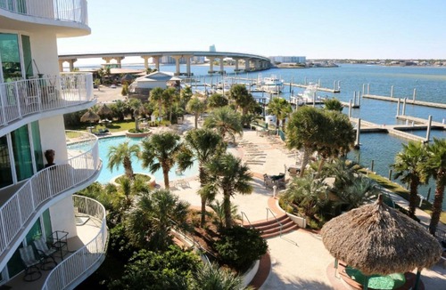 Orange Beach East Condo | Rates just lowered. Enjoy The WHITE BEACHES, LAZY RIVER, the CARIBE has it ALL