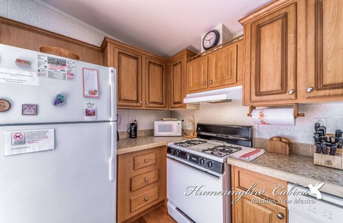 Ruidoso Downs House | Redman! A single level, cozy cabin on a hill with a direct view of the Ruidoso Downs Racetrack!